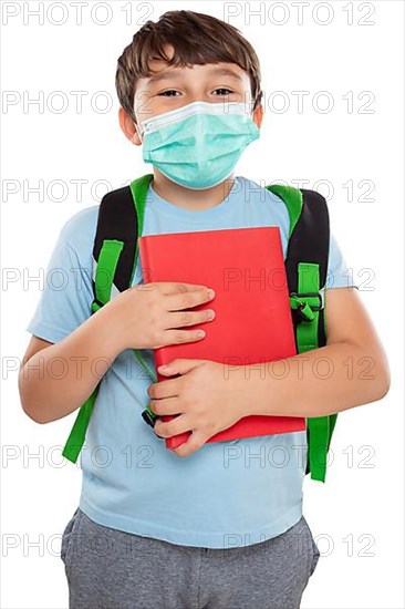 Young pupil child boy with mask against corona virus corona virus isolated exempted in Stuttgart