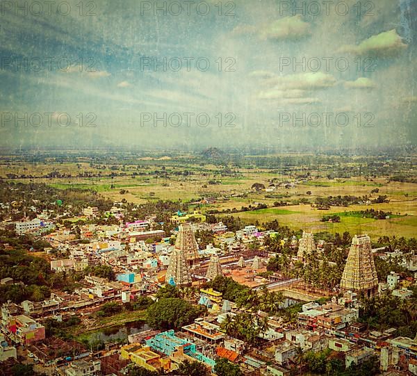 Vintage retro hipster style travel image of Lord Bhakthavatsaleswarar Temple with grunge texture overlaid