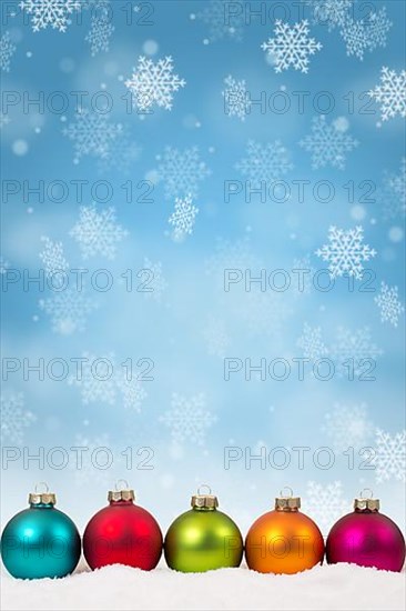 Christmas many colourful Christmas balls decoration snowflakes snow winter text free space in Stuttgart