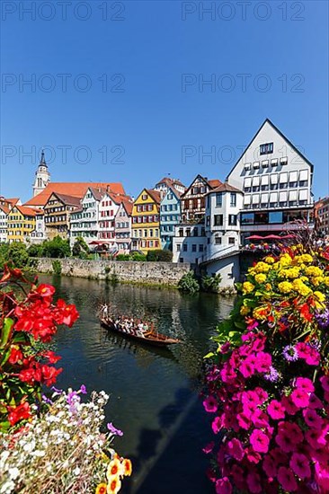 City on the Neckar River with punting boat in Tuebingen