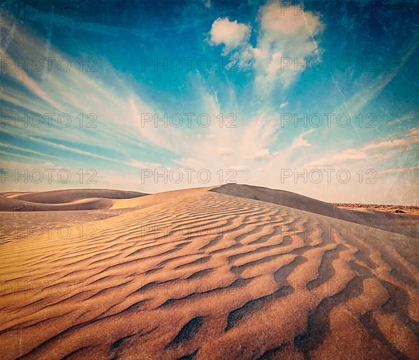 Vintage retro hipster style travel image of dunes of Thar Desert. Sam Sand dunes