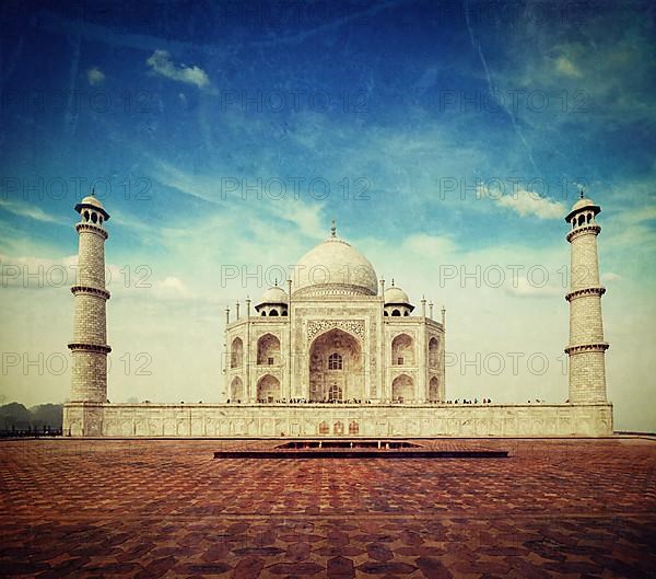 Vintage retro hipster style travel image of Taj Mahal. Indian Symbol