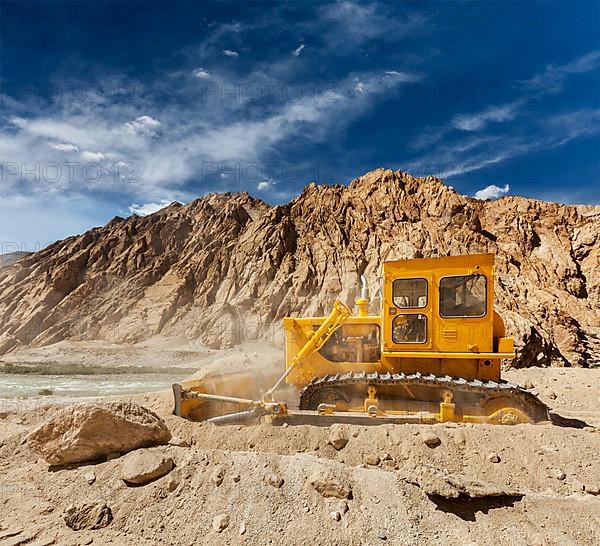 Bulldozer doing road construction in Himalayas. Ladakh