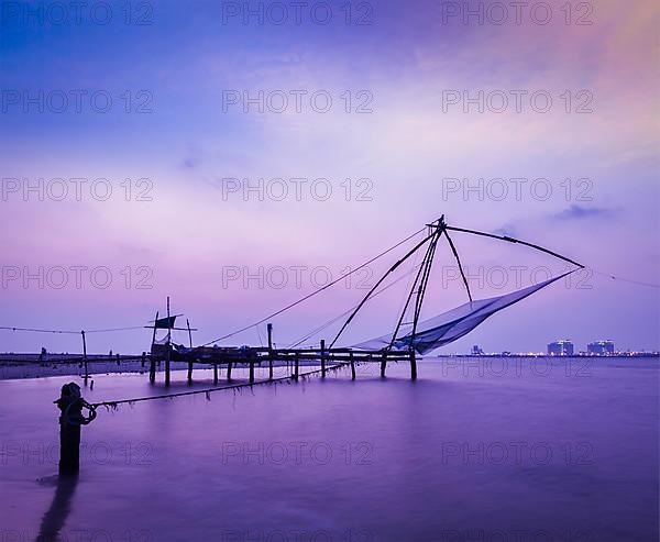 Kochi chinese fishnets on sunset. Fort Kochin