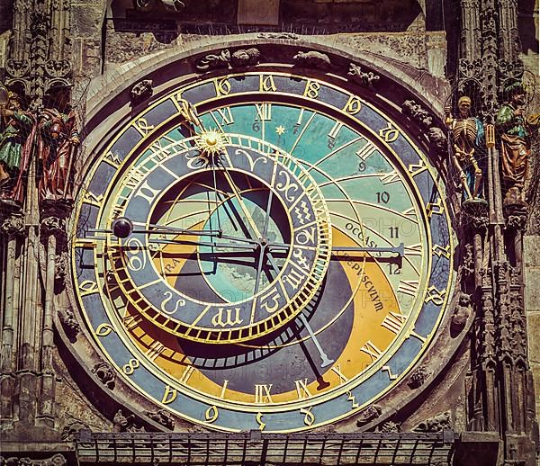 Vintage retro hipster style travel image of astronomical clock on Town Hall. Prague