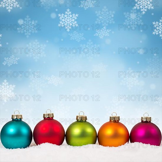 Christmas many colourful Christmas balls square snowflakes snow winter text free space in Stuttgart