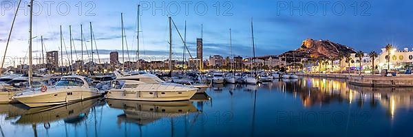 Port of Alicante at night Port dAlacant Marina with boats and view of Castillo Castle holiday travel city panorama in Alicante