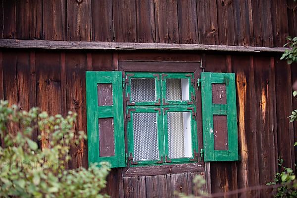 Window idyll in old wooden house