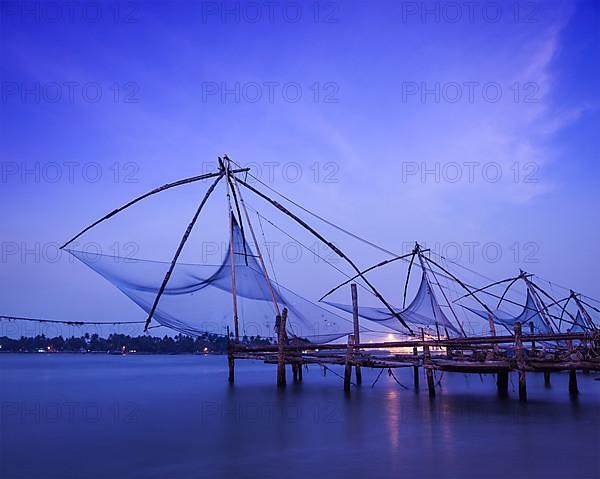 Kochi chinese fishnets on sunset. Fort Kochin