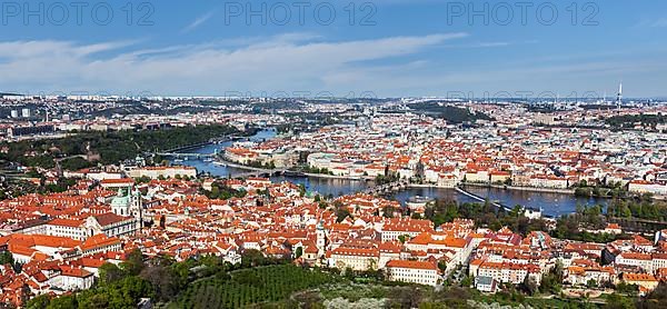 Aerial view of Charles Bridge over Vltava river and Old city from Petrin hill Observation Tower. Prague