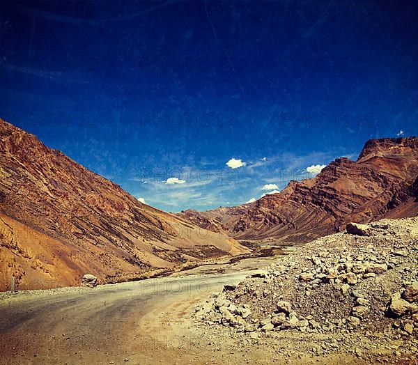 Vintage retro effect filtered hipster style travel image of Manali-Leh road to Ladakh in Indian Himalayas with grunge texture overlaid. Ladakh