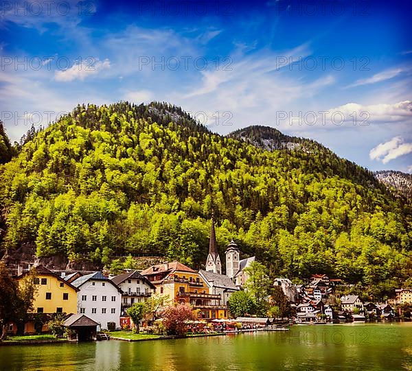 Vintage retro effect filtered hipster style travel image of Austrian tourist destination Hallstatt village on Hallstatter See in Austrian alps. Salzkammergut region