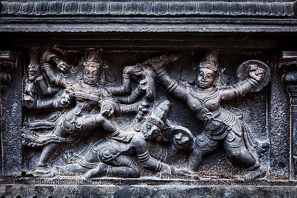 Bas relief depicting Durga slaying demon