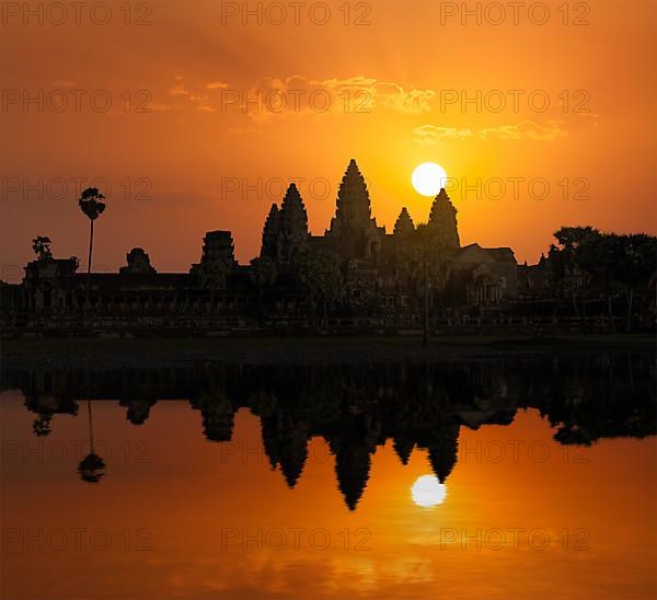 Cambodia landmark Angkor Wat with reflection in water on sunrise