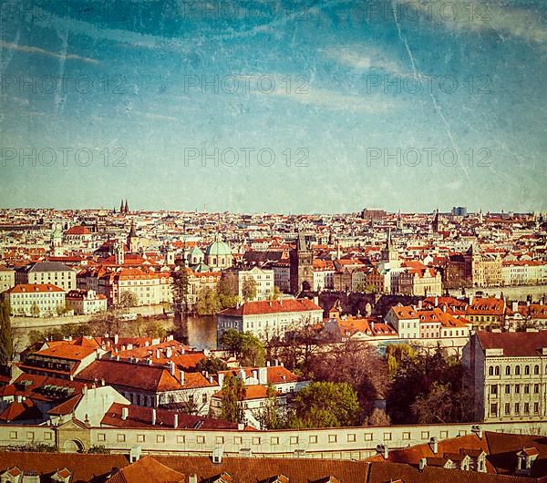 Vintage retro hipster style travel image of aerial view of Prague from Prague Castle. Prague
