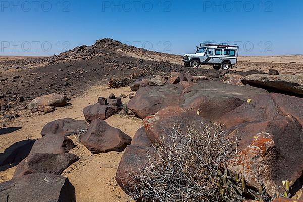 Vehicle in the boulder desert
