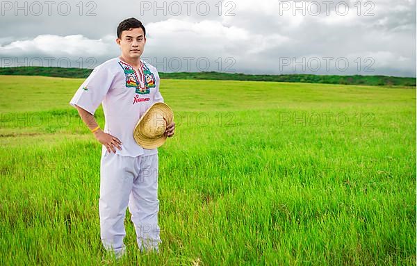 Man wearing Central American folk costume