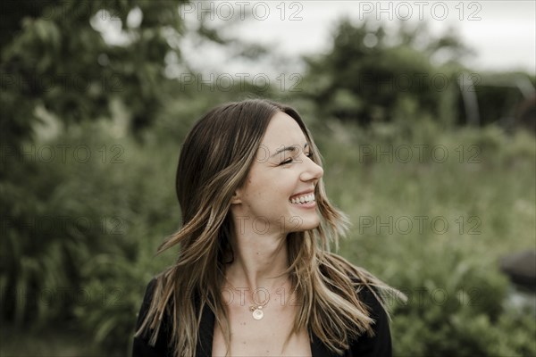 Laughing young woman in portrait