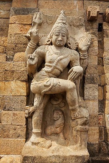 Stone statue of guardian Hindu deity in Gangai Konda Cholapuram Temple
