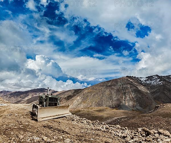 Bulldozer on road in Himalayas. Ladakh