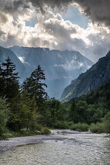 Torrener Ache in the Bluntau valley with dramatic clouds