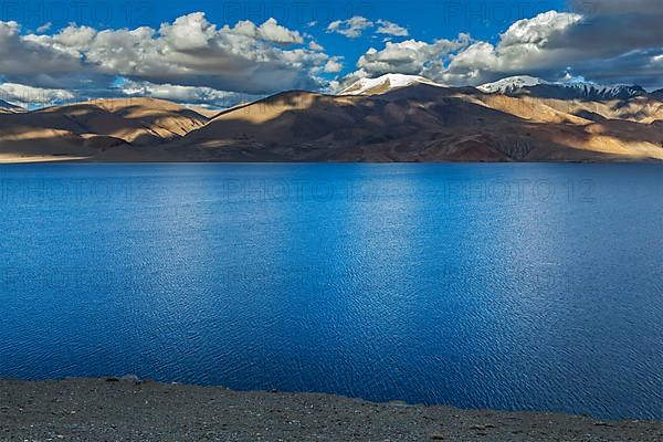 Himalayan mountain lake in Himalayas Tso Moriri on sunset