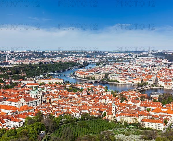 Aerial view of Charles Bridge over Vltava river and Old city from Petrin hill Observation Tower. Prague