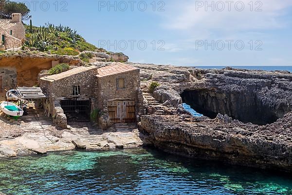 Fishermen's huts in Cala de s'Almonia