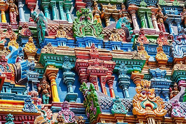 Sculptures on Hindu temple gopura tower. Meenakshi Temple