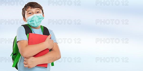 Young Pupil Child Boy with Mask against Corona Virus with Text Free Space Copyspace in Stuttgart