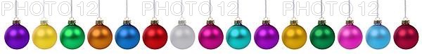 Christmas colourful Christmas baubles decoration colours in a row clutter against a white background