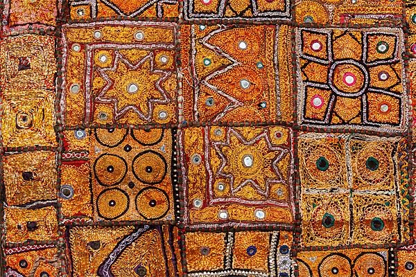 Colorful indian fabric textile texture background. India
