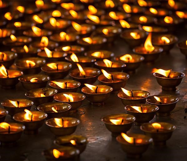 Burning candles in Buddhist temple