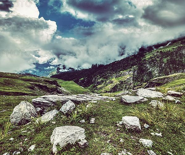 Vintage retro effect filtered hipster style travel image of mountain landscape in Himalayas. Kullu valley