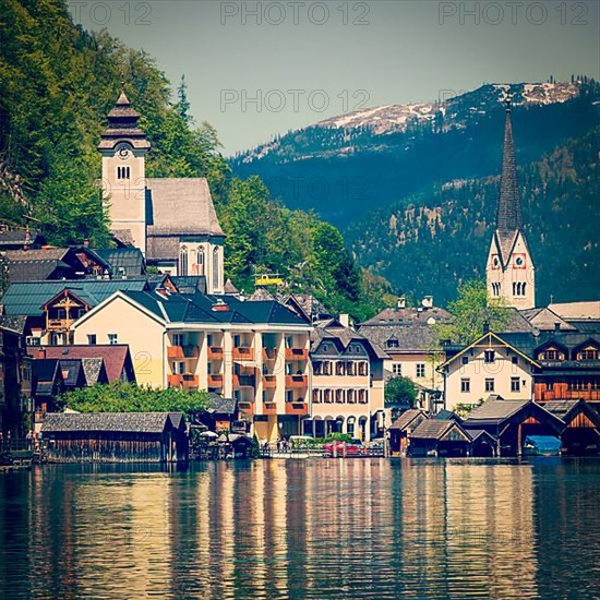 Vintage retro effect filtered hipster style travel image of Austrian tourist destination Hallstatt village on Hallstatter See in Austrian alps. Salzkammergut region