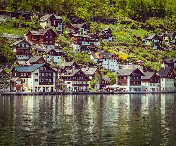 Vintage retro effect filtered hipster style travel image of Austrian tourist destination Hallstatt village on Hallstatter See in Austrian alps. Salzkammergut region