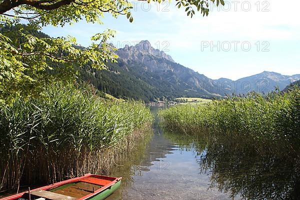 Haldensee with view of Gimpel and Rote Flueh in the Tannheim Valley