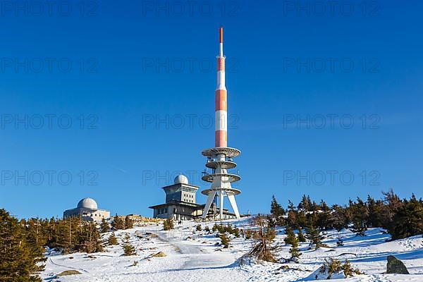 Summit of the Brocken mountain in the Harz mountains with snow in winter at the Brocken