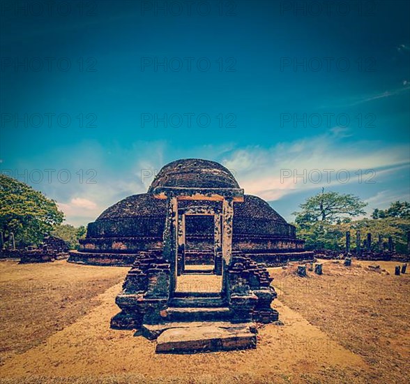 Vintage retro hipster style travel image of ancient Buddhist dagoba