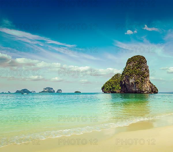 Vintage retro hipster style travel image of Pranang beach. Krabi