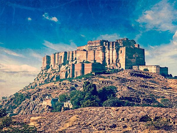 Vintage retro hipster style travel image of Mehrangarh Fort