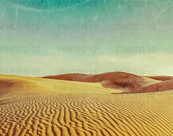 Vintage retro hipster style travel image of dunes of Thar Desert. Sam Sand dunes