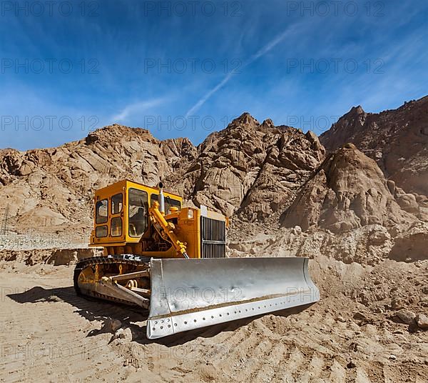 Bulldozer doing road construction in Himalayas. Ladakh