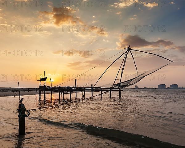 Kochi chinese fishnets on sunset. Fort Kochin