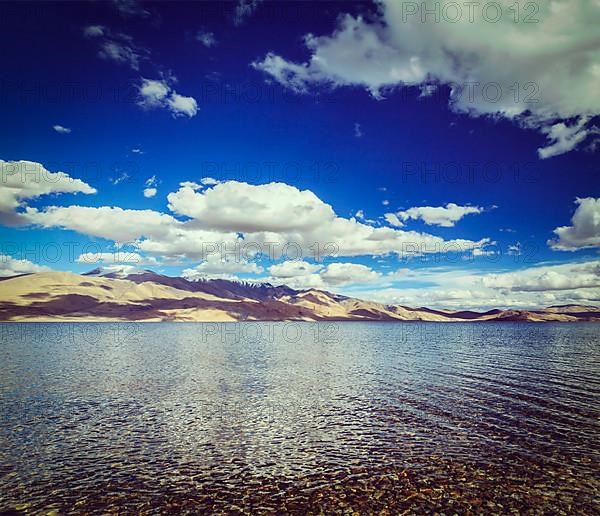 Vintage retro effect hipster style travel image of Himalayan lake in Himalayas Tso Moriri