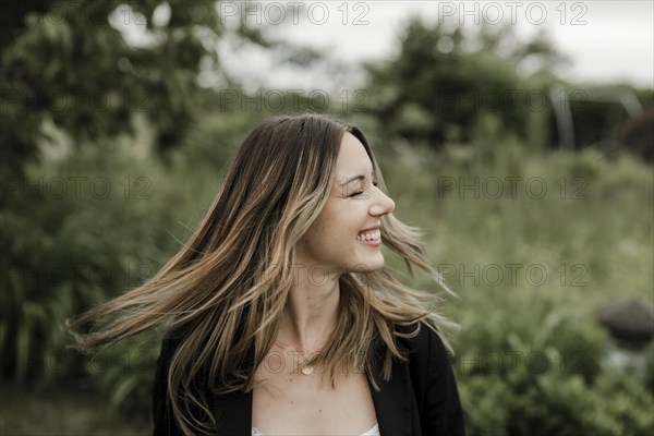 Laughing young woman in portrait