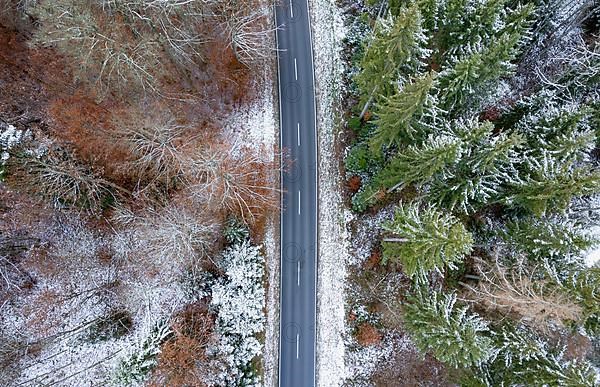Drone image of a forest road in winter