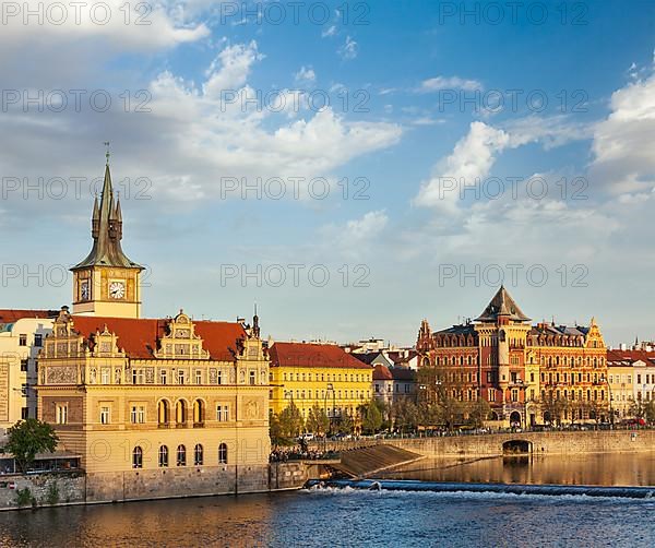 Prague Stare Mesto embankment view from Charles bridge on sunset. Prague