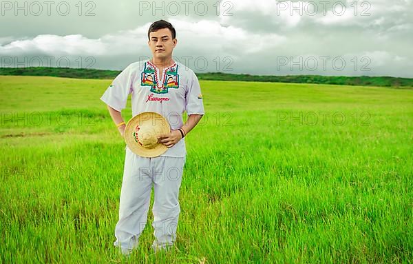 Young man in cultural and folk costume from Nicaragua. Concept of man in Nicaraguan folk costume