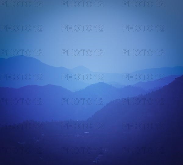 Vintage retro effect filtered hipster style travel image of mountains Himalayas after sunset. With copyspace. Shimla